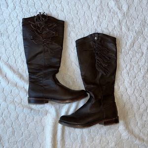 Brown riding boots with subtle fringe on top!